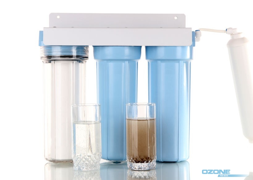 Filter system for water treatment with glasses of clean and dirty water  isolated on white.